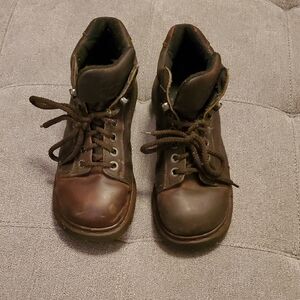 Very well loved Dr. Martens Brown Boots with Rugged Appearance and Durable Soles